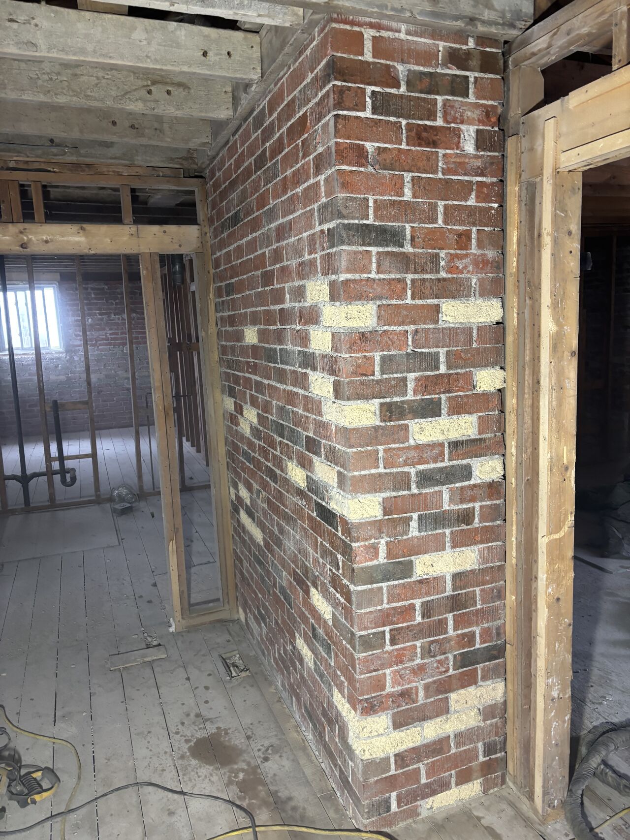 Clean red brick chimney after dry ice blasting fire restoration in Chatham, Ontario — original brick color and detail fully restored by Ontario Dry Ice Blasting
