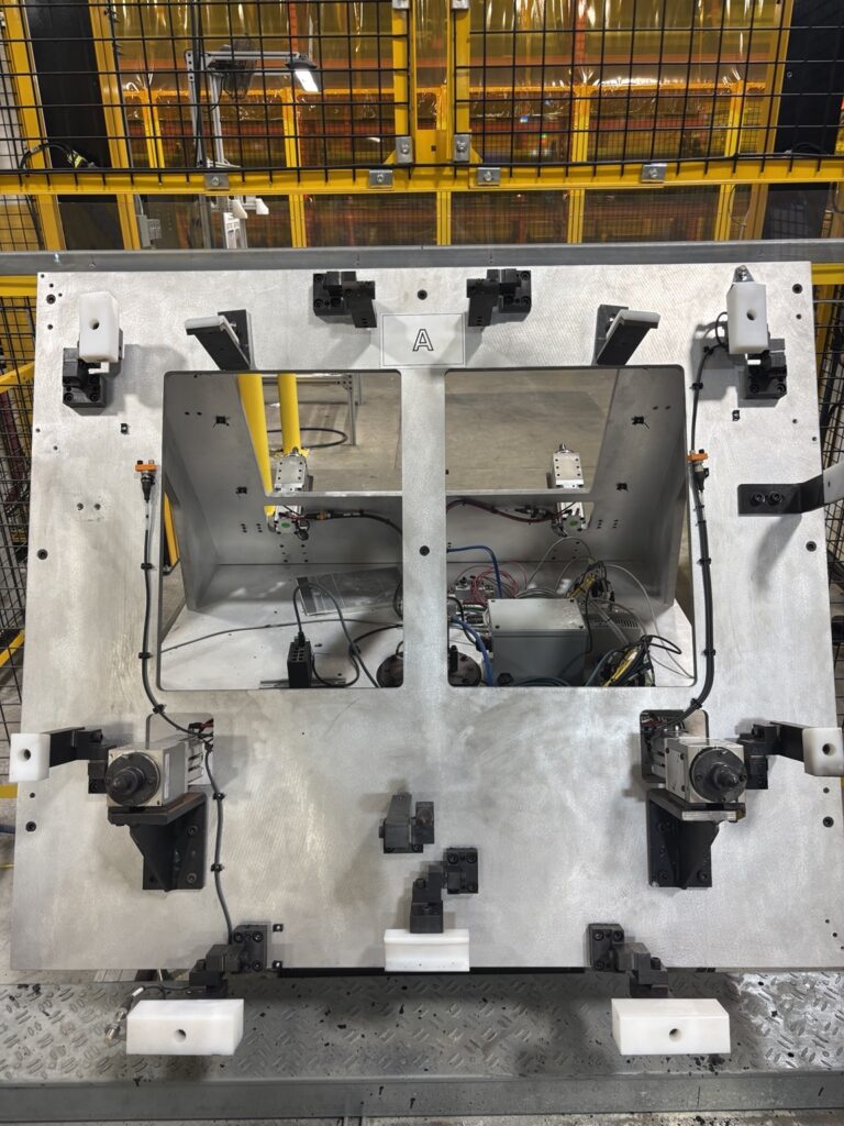Clean fixture after dry ice blasting, adhesive removed without abrasion — Windsor automotive plant