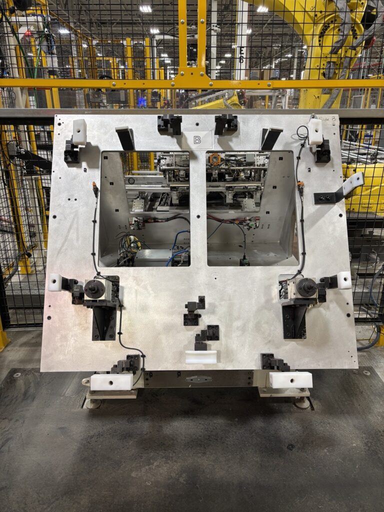 Clean fixture after dry ice blasting, adhesive removed without abrasion — Windsor automotive plant