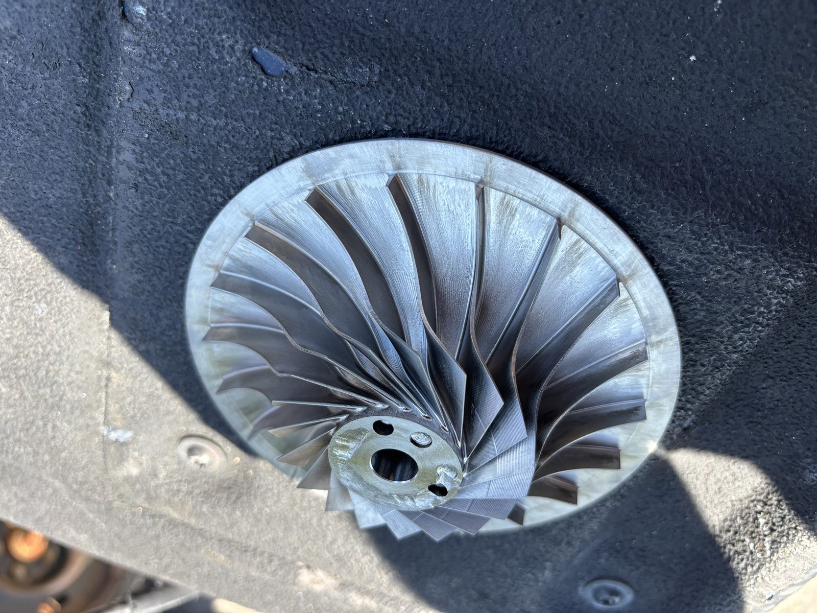 Cleaned fin fan impeller showing even finish across all blades after dry ice blasting