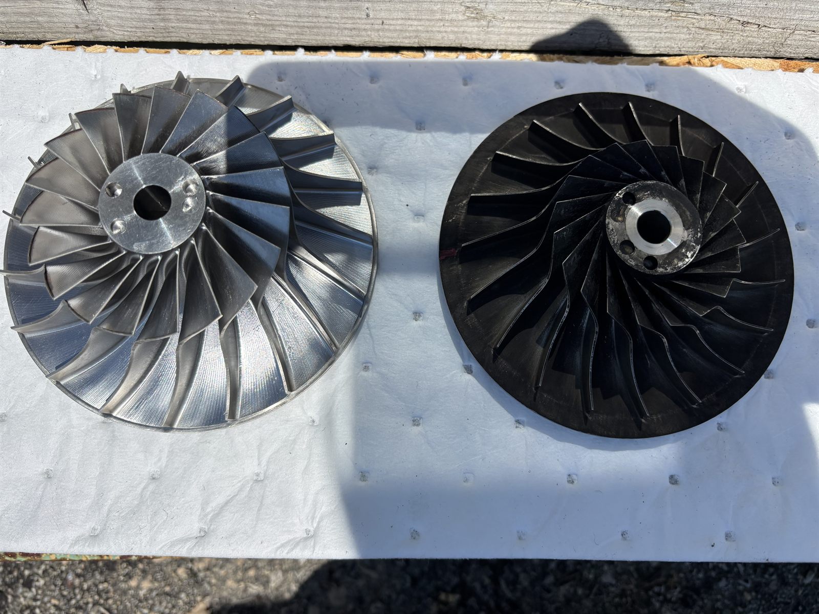 Fin fan impeller before and after dry ice blasting, carbon fouled and cleaned to parent metal